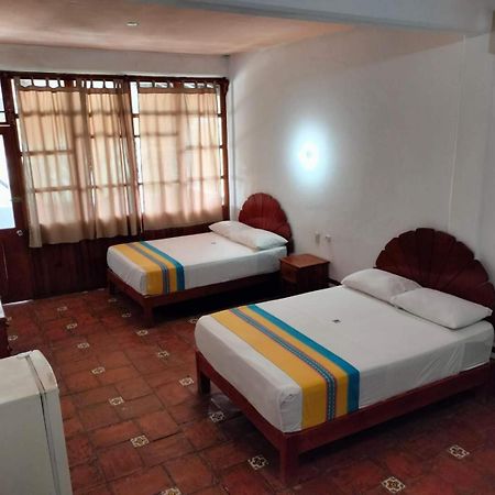 Hotel Bungalows Acuario ปูแอร์โตเอสกอนดิโด ภายนอก รูปภาพ