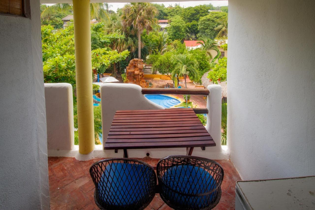 Hotel Bungalows Acuario ปูแอร์โตเอสกอนดิโด ภายนอก รูปภาพ