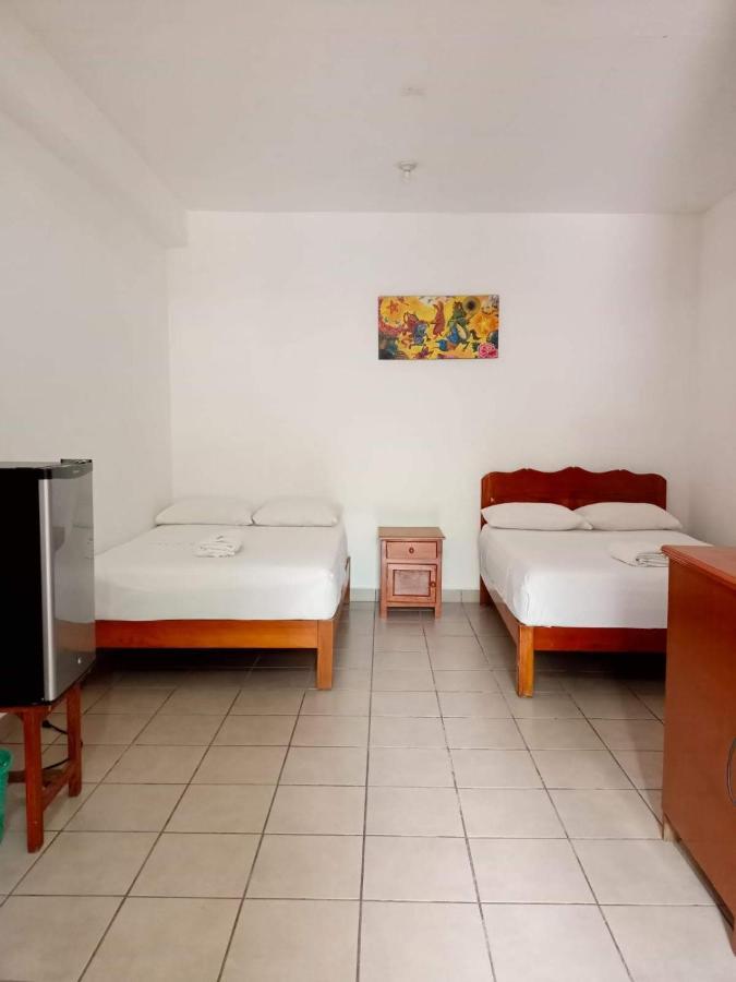 Hotel Bungalows Acuario ปูแอร์โตเอสกอนดิโด ภายนอก รูปภาพ