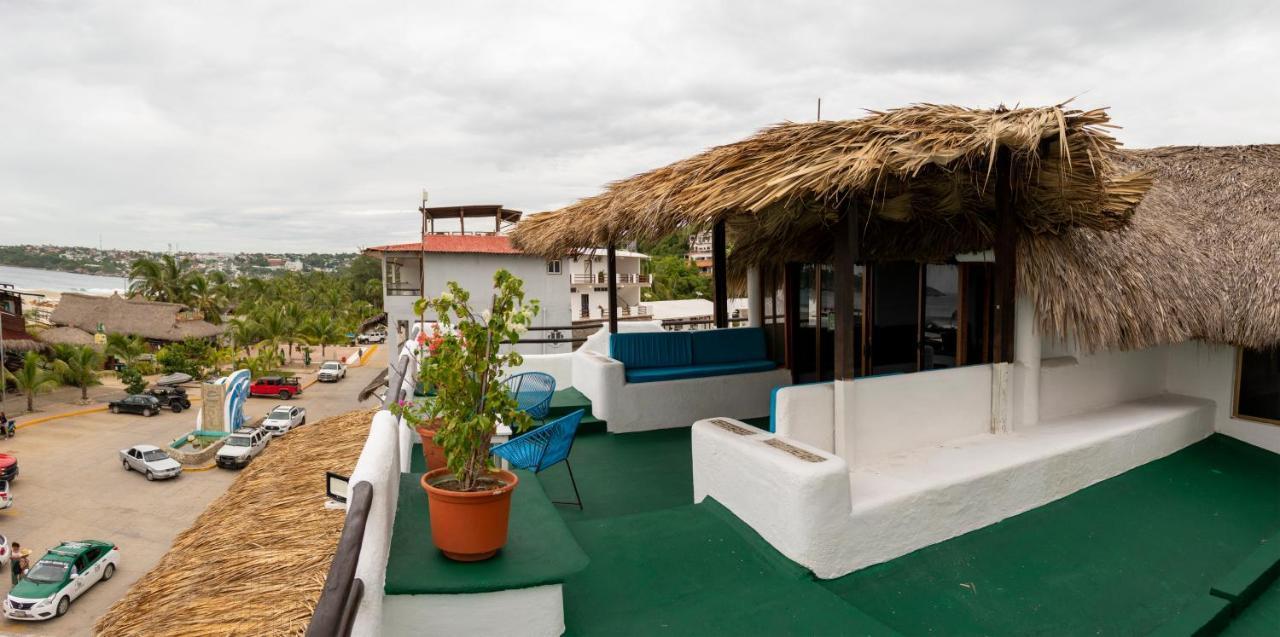 Hotel Bungalows Acuario ปูแอร์โตเอสกอนดิโด ภายนอก รูปภาพ