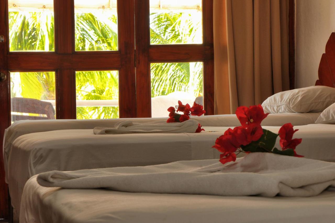 Hotel Bungalows Acuario ปูแอร์โตเอสกอนดิโด ภายนอก รูปภาพ