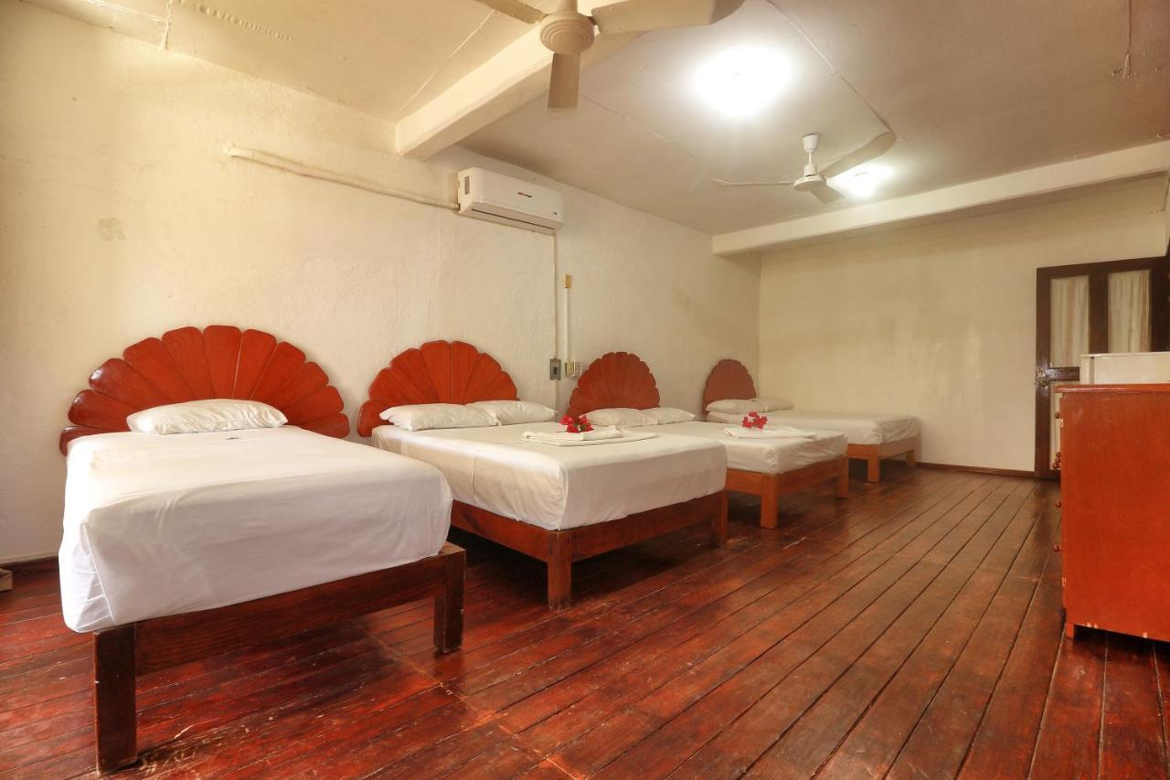 Hotel Bungalows Acuario ปูแอร์โตเอสกอนดิโด ภายนอก รูปภาพ