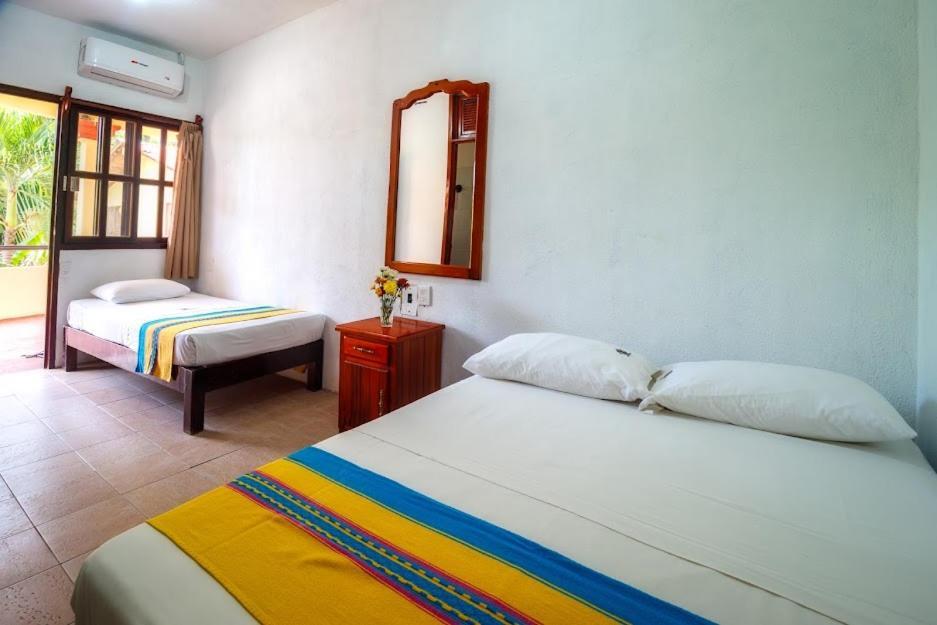 Hotel Bungalows Acuario ปูแอร์โตเอสกอนดิโด ภายนอก รูปภาพ